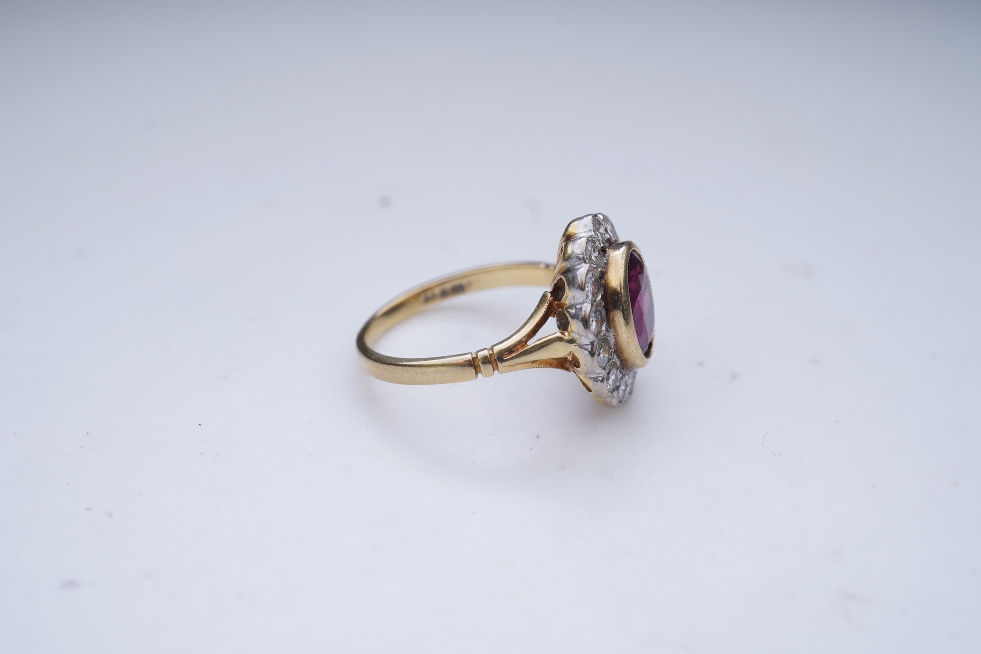 A ruby and diamond cluster ring